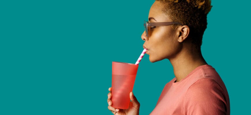 Profile,Portrait,Of,A,Cool,Young,Woman,In,Pink,Holding