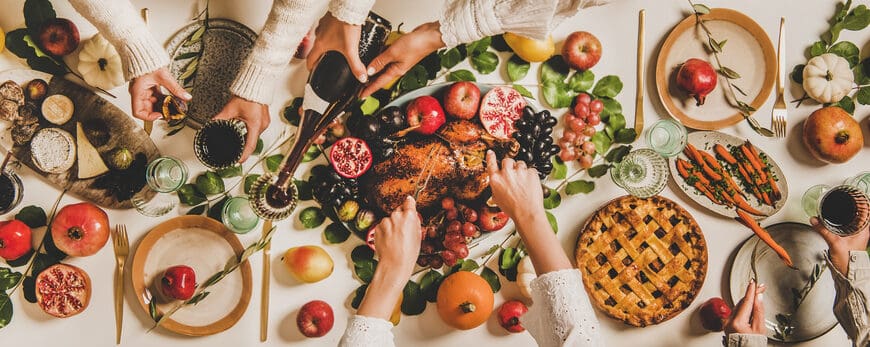 Autumn,Thanksgiving,,Friendsgiving,,Family,Party,Dinner.,Flat-lay,Of,Peoples,Hands